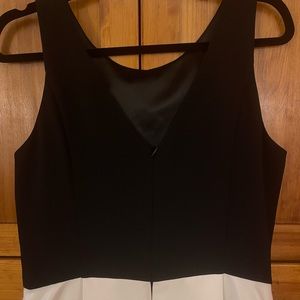 A WhiteHouseBlackMarket fully lined black and white polyester semi-formal dress!